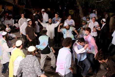Group photo in tie-dye tzitzit