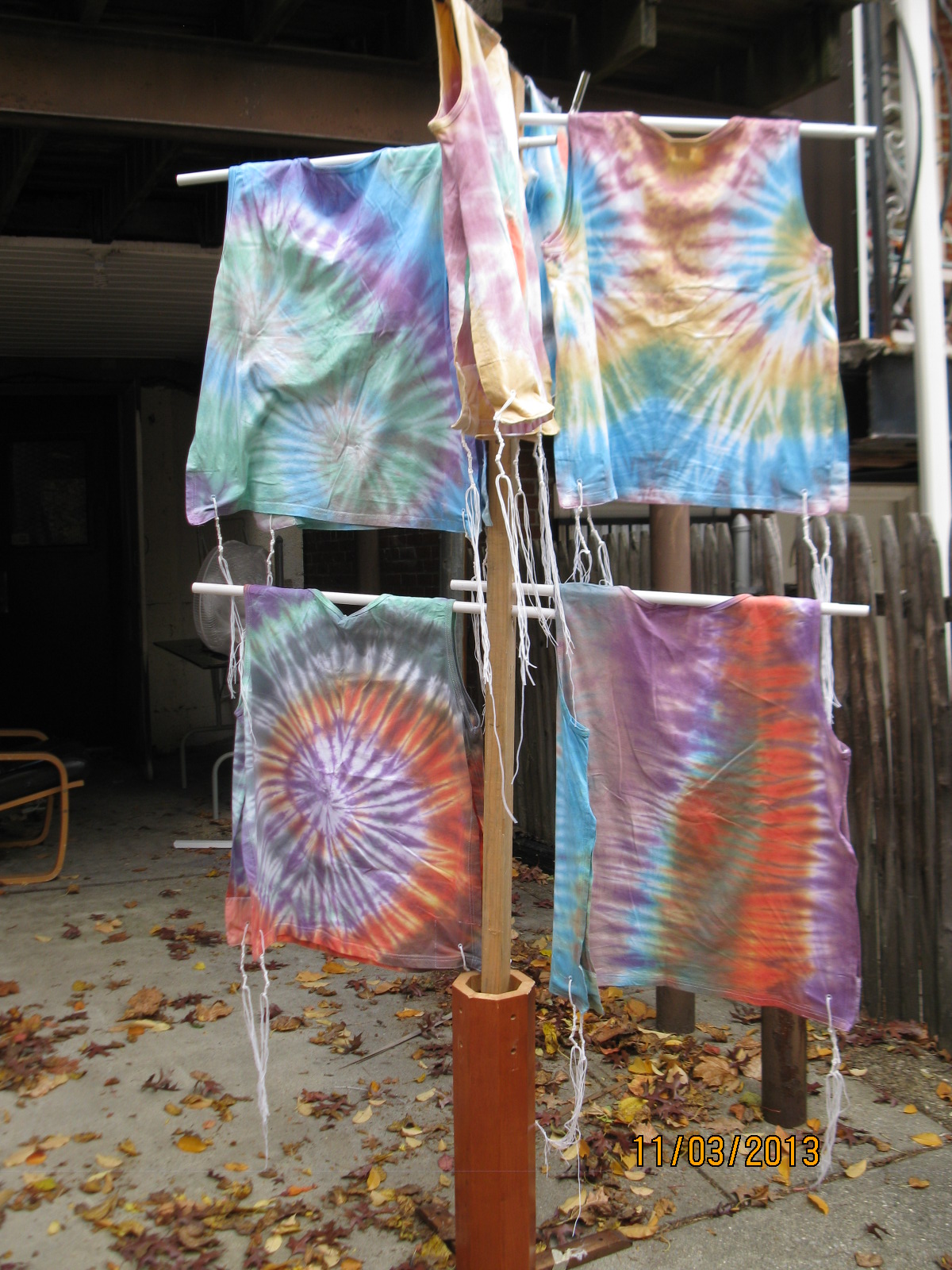Freshly dyed tzitzit drying outdoors